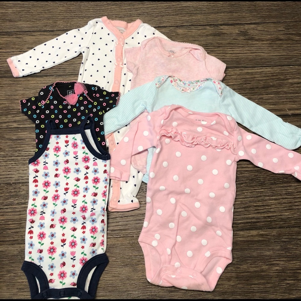 Set of onesies. All newborn sized. Great condition